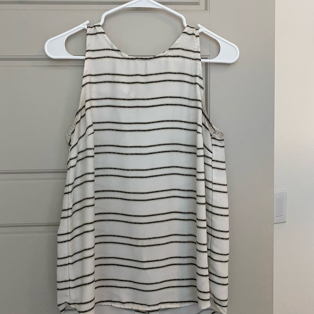 White sleeveless blouse
